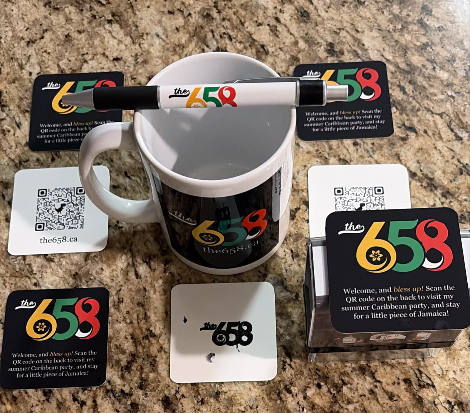 Promotional merchandise for the 658 including mug, pen, coasters and cards