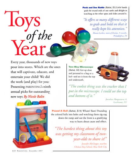 Magazine feature spread showing Toys of the Year picks with rattle, microscope and pound-a-ball toys